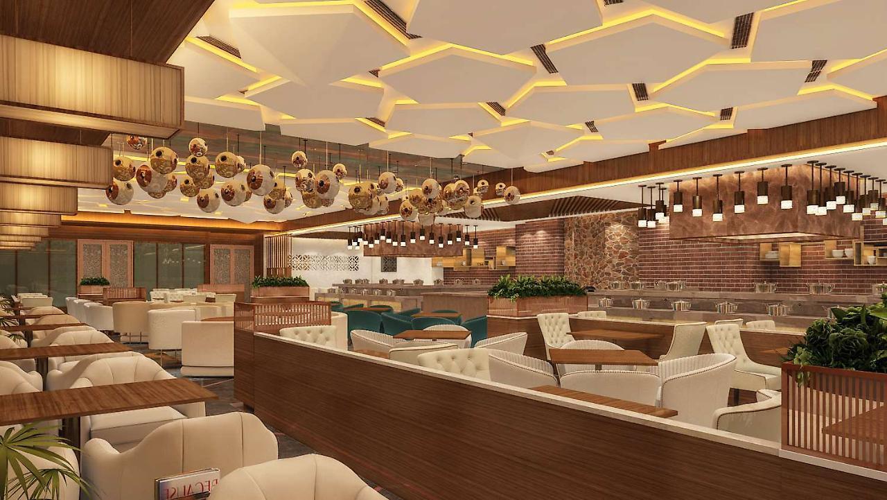 Radisson Blu Towers Kaushambi Delhi Ncr Hotell Ghaziabad Exteriör bild Interior of a restaurant
