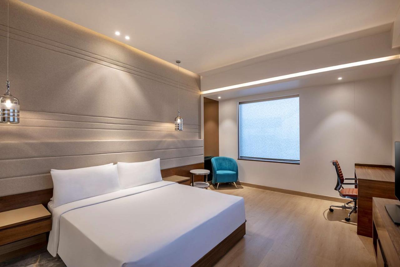 Radisson Blu Towers Kaushambi Delhi Ncr Hotell Ghaziabad Exteriör bild A room at the hotel