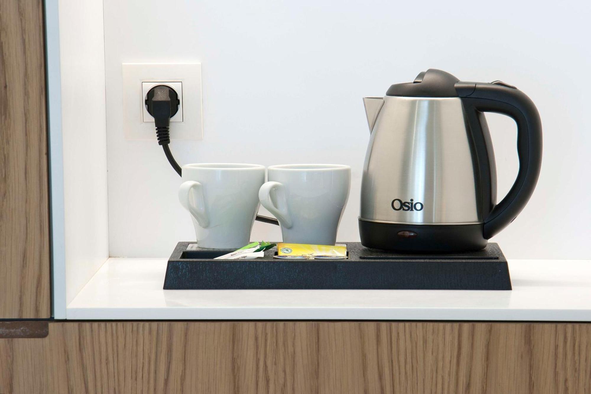 Radisson Blu Towers Kaushambi Delhi Ncr Hotell Ghaziabad Exteriör bild A kettle